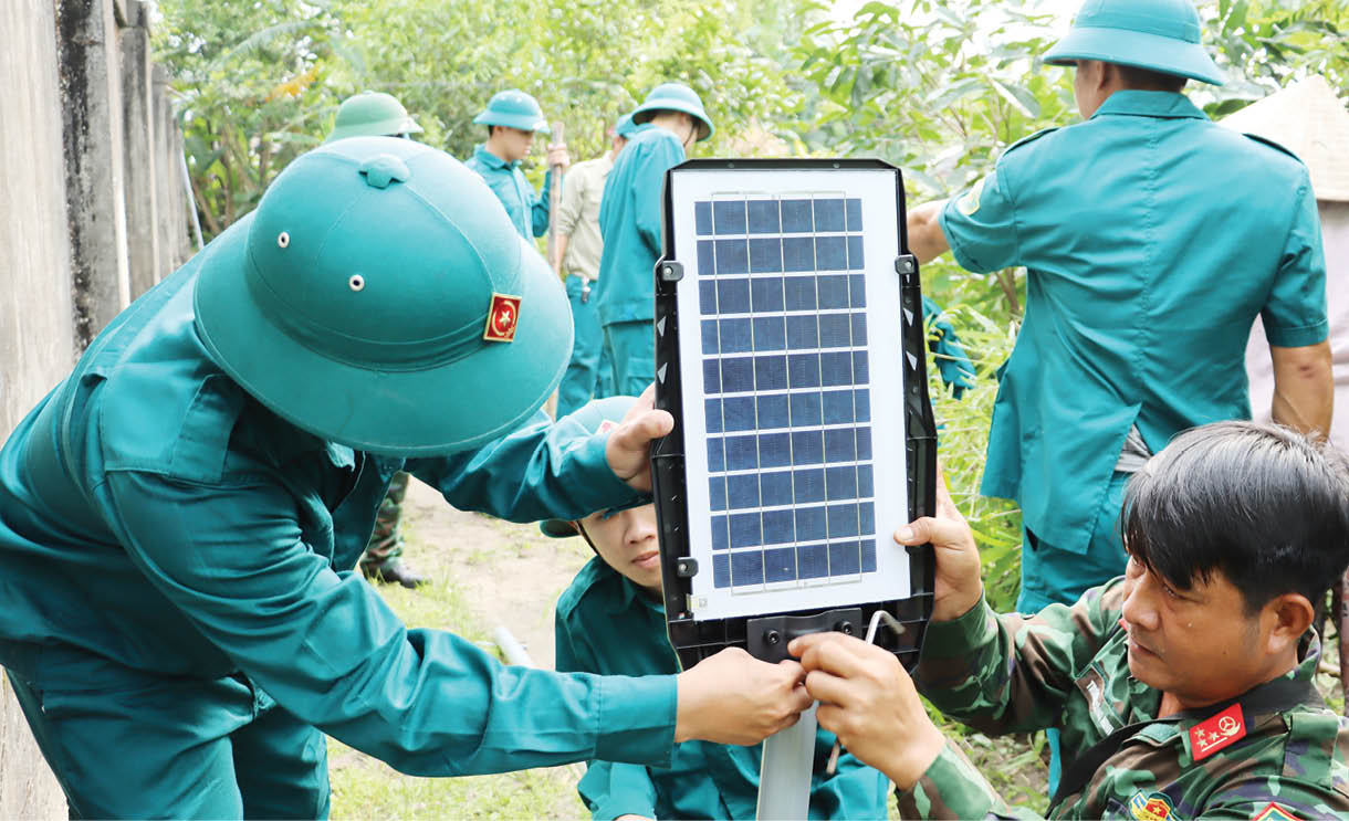 Quân dân chung sức thắp sáng đường quê