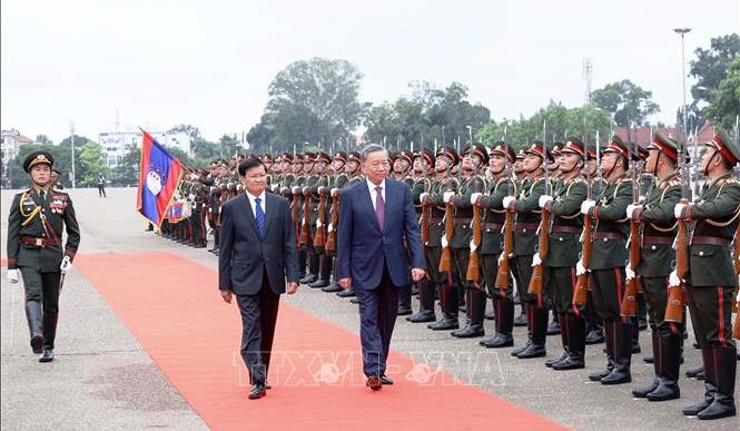 Lễ đón chính thức Chủ tịch nước Tô Lâm thăm cấp Nhà nước tới Lào