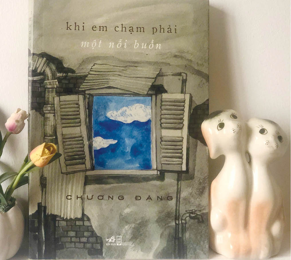 Khi em chạm phải một nỗi buồn