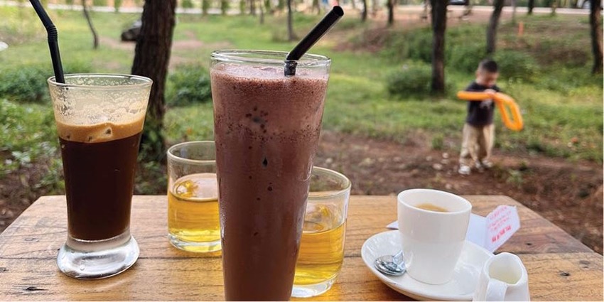 Enjoying coffee, reading book​  watching Vong Canh hill