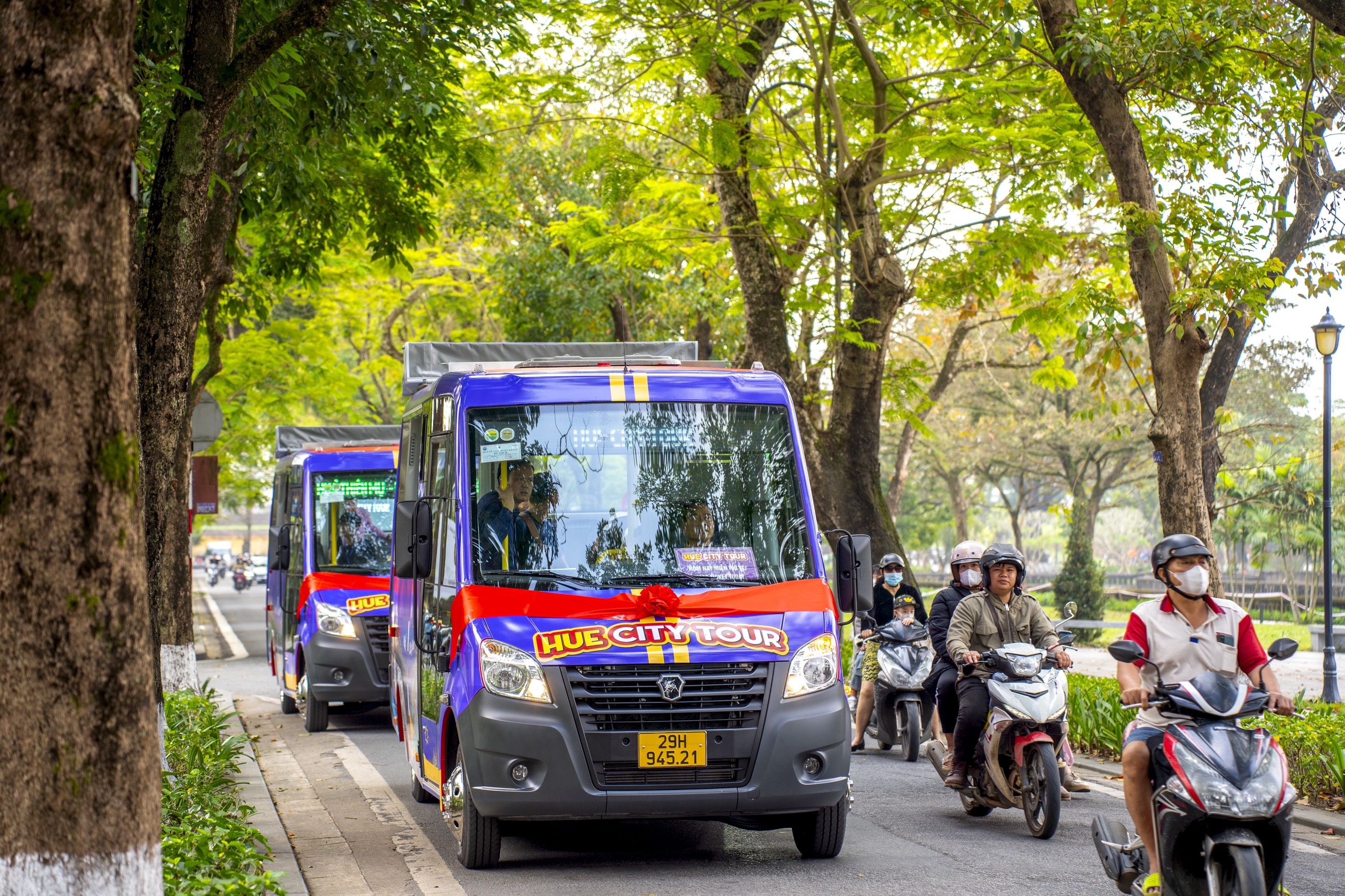 Admiring Hue’s beauty with open top single-decker buses