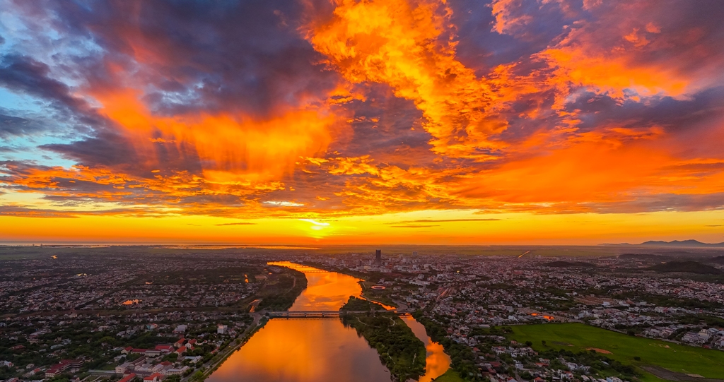 Sunrise over the Huong river