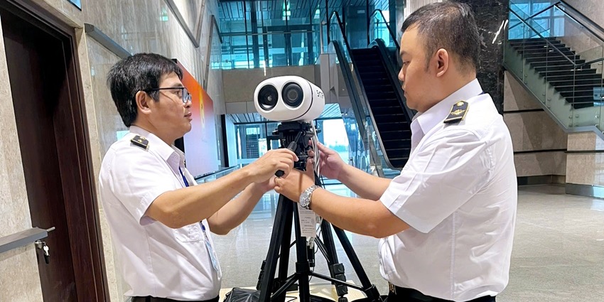 Maintaining the two temperature screening systems at Phu Bai International Airport