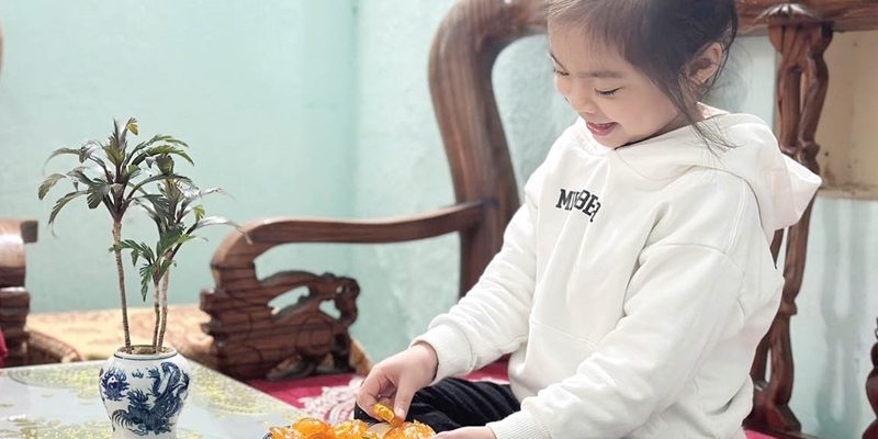 The taste of Tet in family kitchens with handmade candied fruits and sweet treats