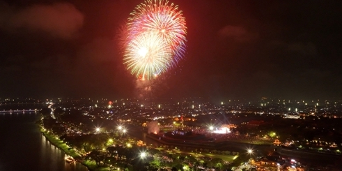 Excitedly watching fireworks, welcoming the New Year