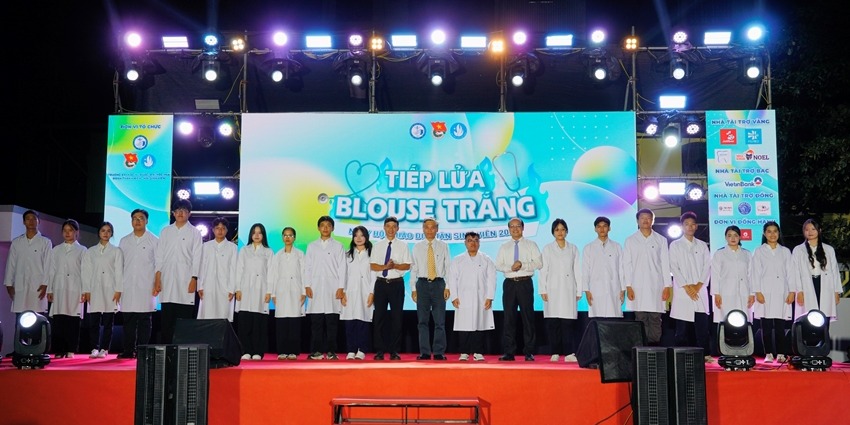 Passing the Torch of the White Coat to new students at Hue University of Medicine and Pharmacy