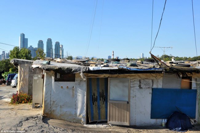 Ảnh phơi bày khoảng cách giàu nghèo trên thế giới hình ảnh 15 anh phoi bay khoang cach giau ngheo tren the gioi hinh anh 15