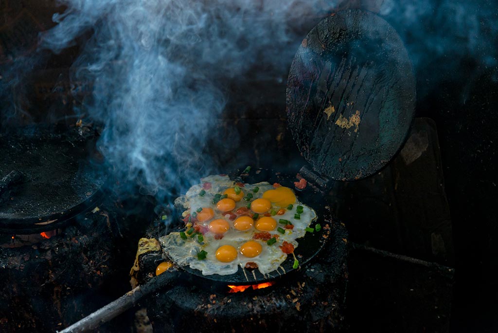 Pressed cakes with fried eggs 