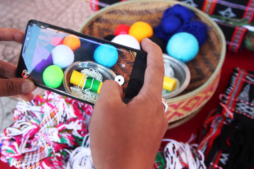 A statue on display attracts people's attention