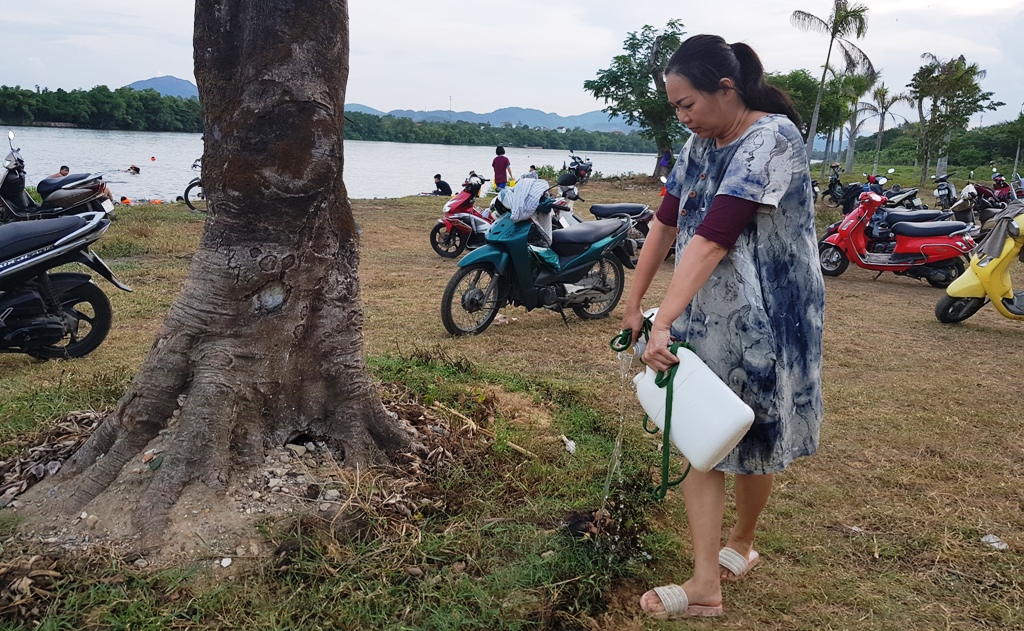 On the river bank, a member of the 