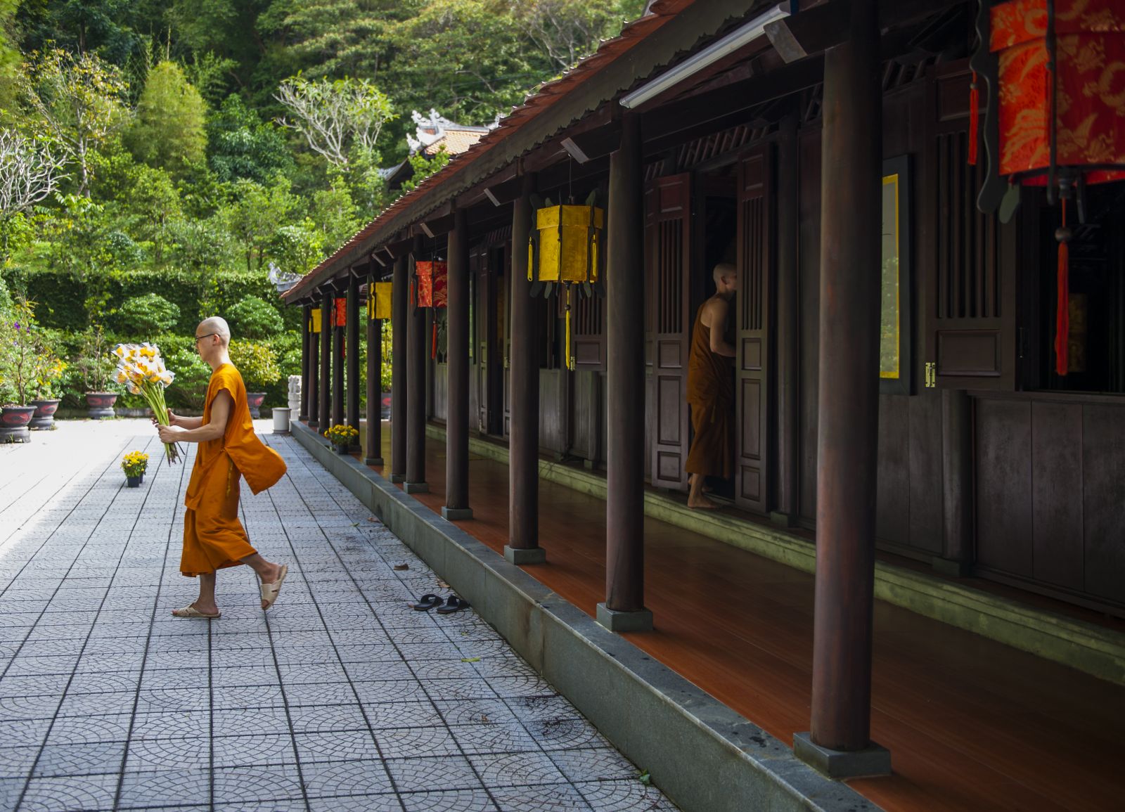 The monks decorating the flowers for the front hall