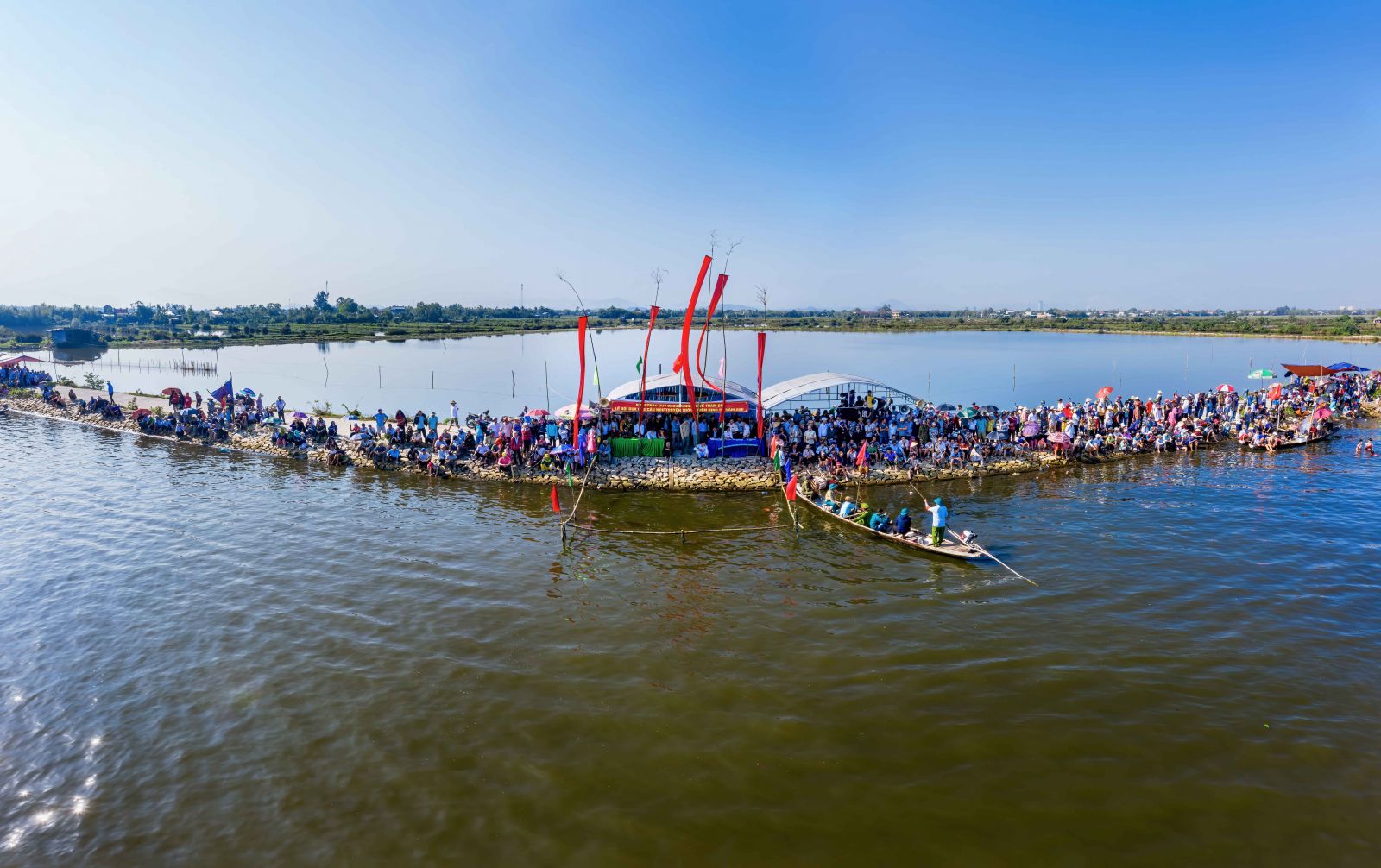 The crowd gathered on the shore to cheer the competitors
