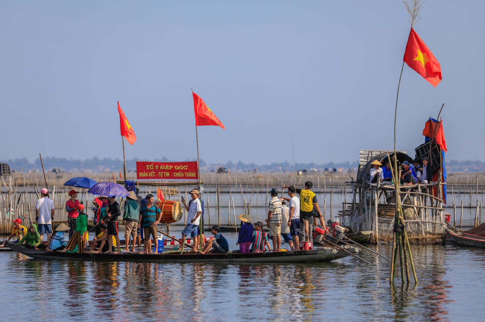 The audience enthusiastically cheering