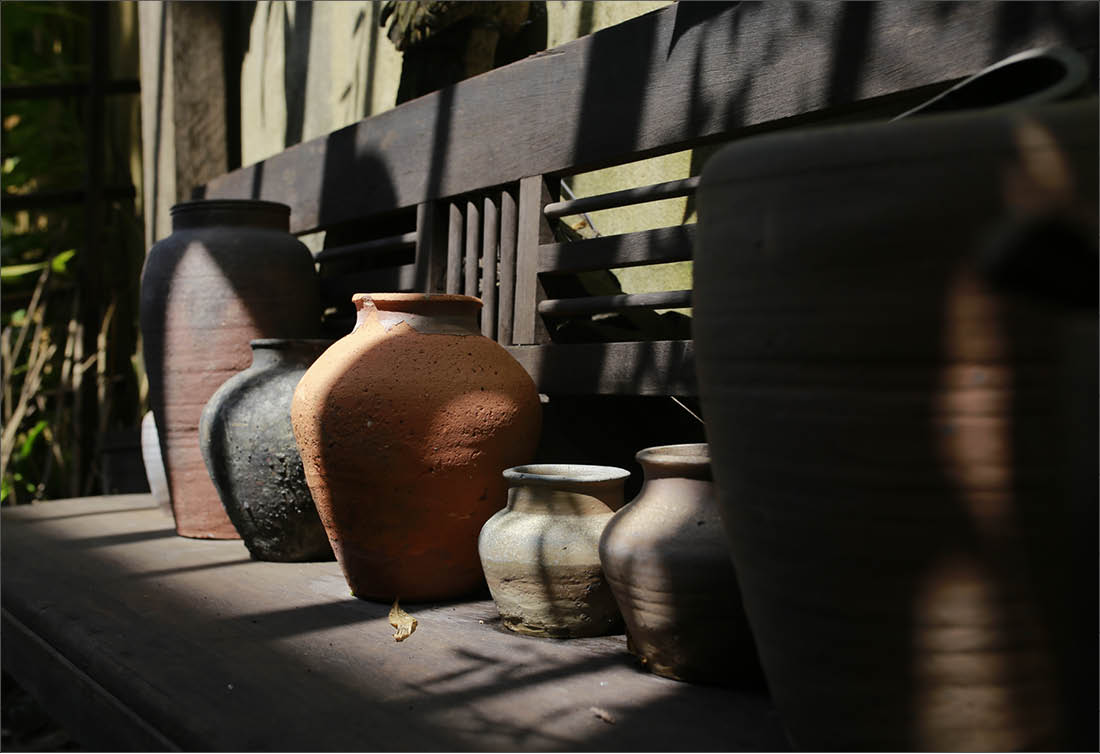 Thermos, water jars, and the familiar kitchen corner