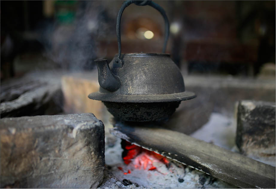 Thermos, water jars, and the familiar kitchen corner