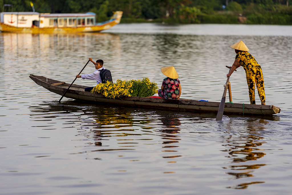 Rowing up the river to get to town