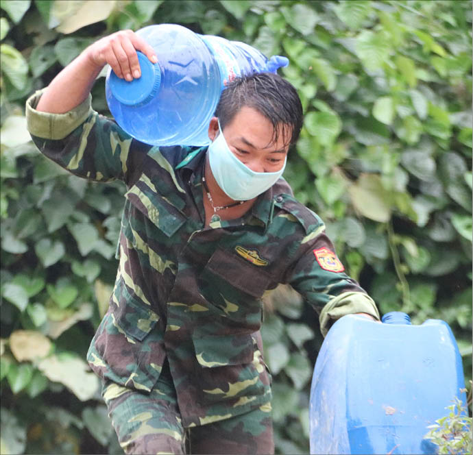 Collecting clean spring water for use when needed