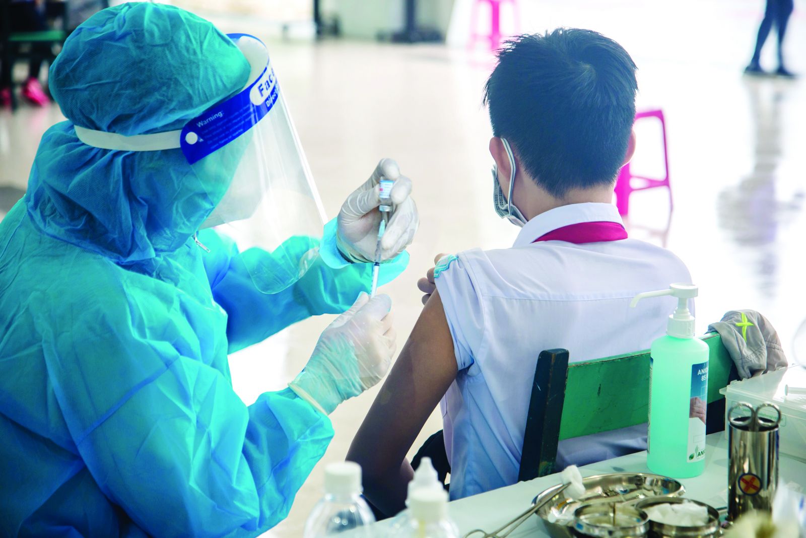 Wearing school uniforms to get vaccinated