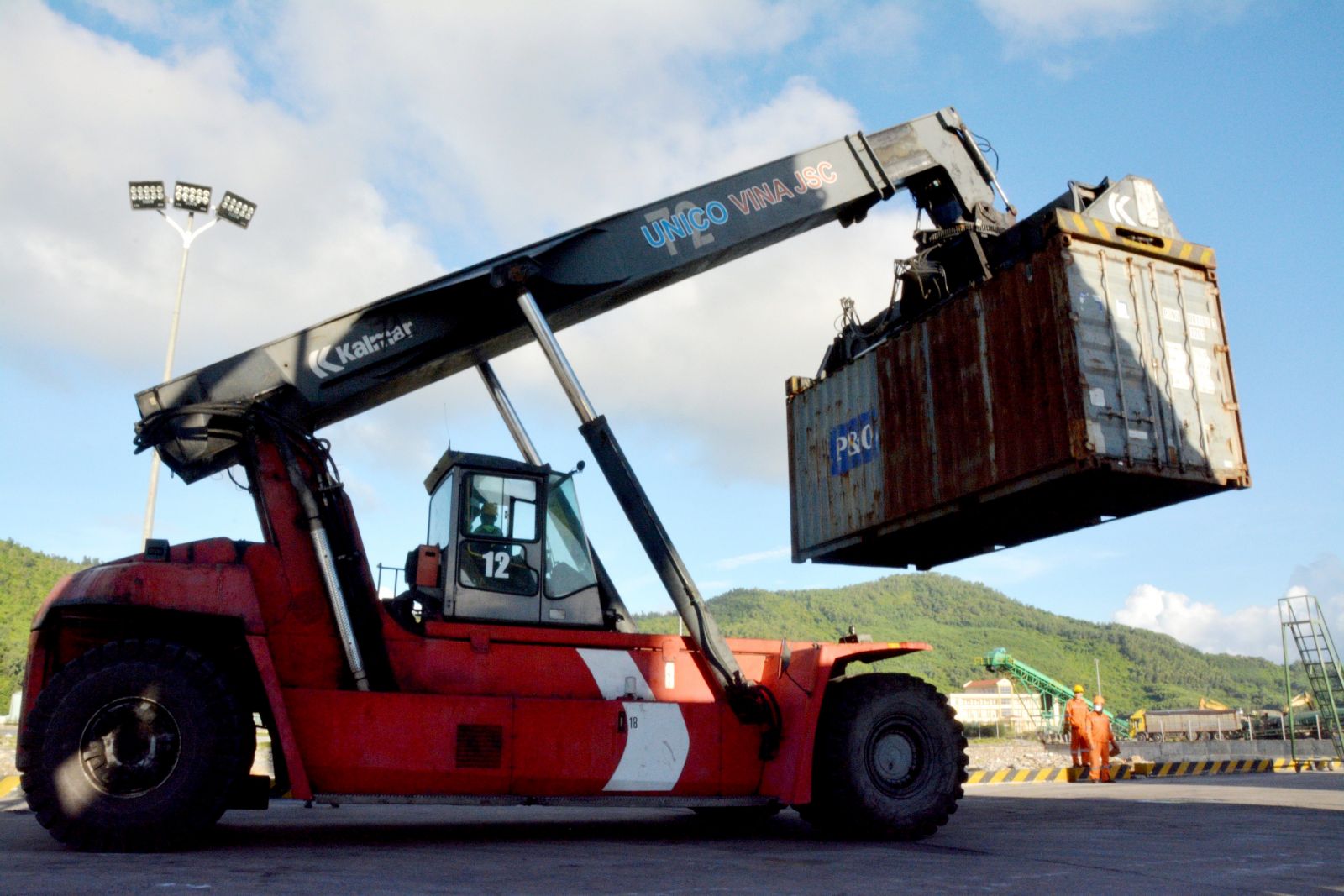 Each container being brought to the gathering place by the system of forklifts, cranes, etc.