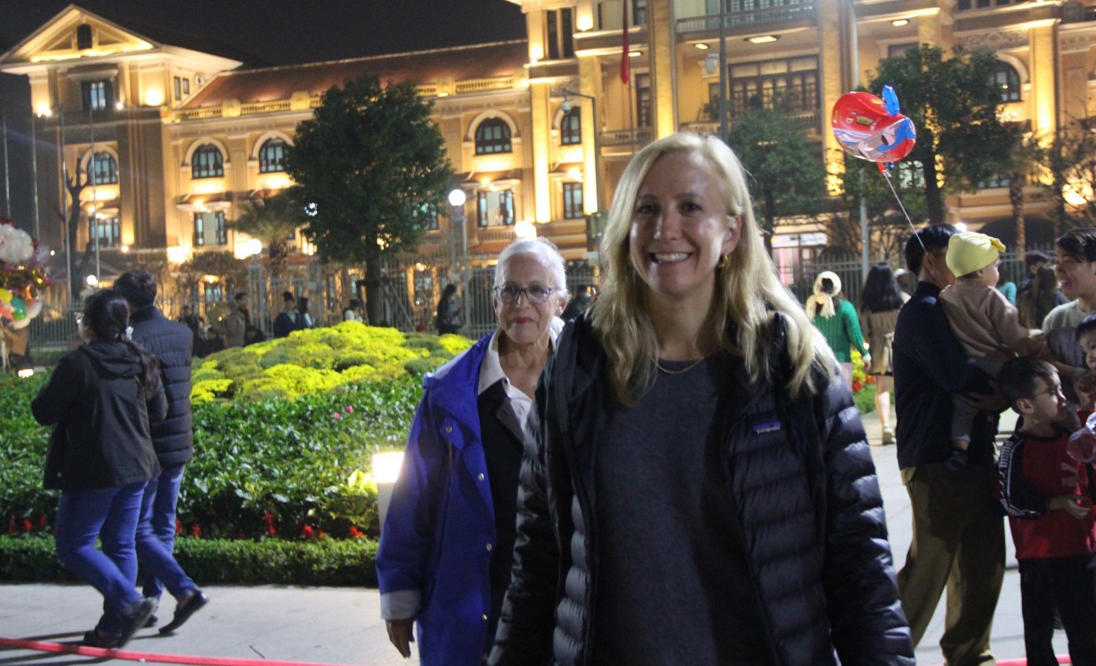 Tourists take to the streets, joining the crowd to celebrate the Lunar New Year in Hue