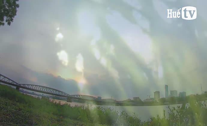 Shady walking path along northern bank of Huong River