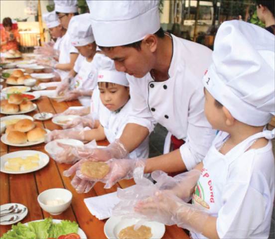 Children enjoying kitchen experience
