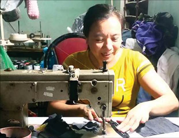 Tiệm may của cô chủ khuyết tật