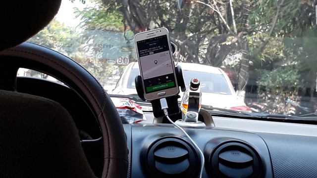 Dự thảo quy định quản lý đối với Grab taxi tiếp tục bị phản đối