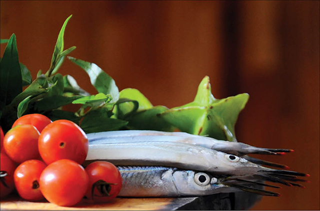 Halfbeak soup with sour star-fruit