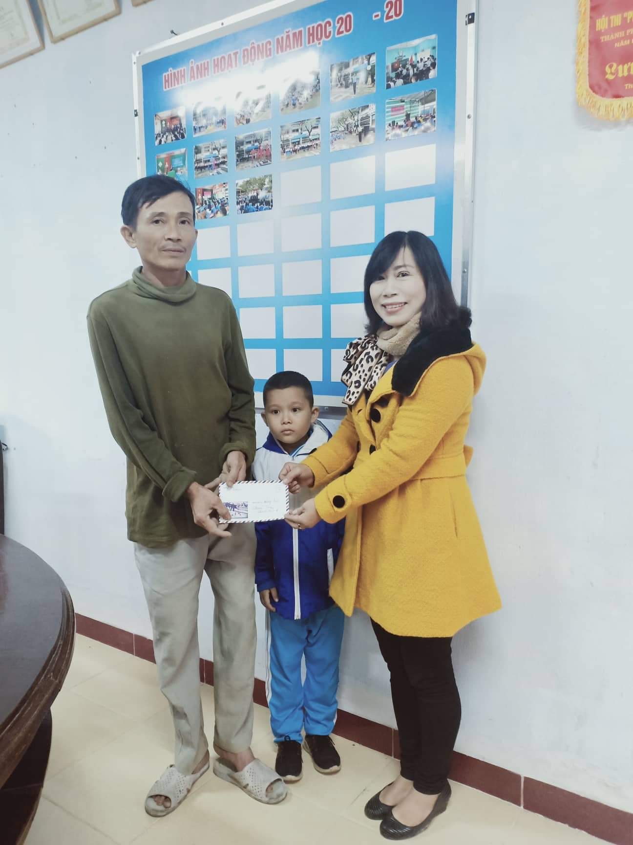 Cháu Quốc Toàn được hỗ trợ 4 triệu đồng