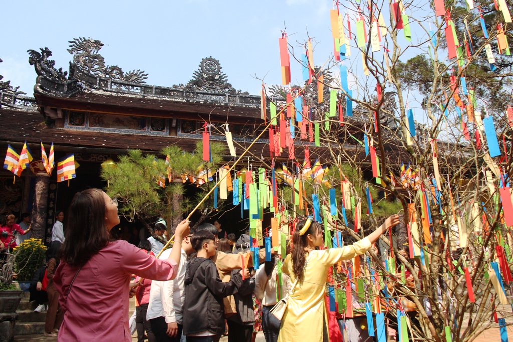 Visiting Buddhist pagodas on the first day of the Lunar New Year