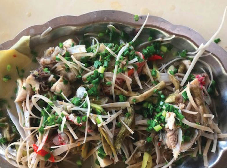 Flounder braised with fermented cassava peel