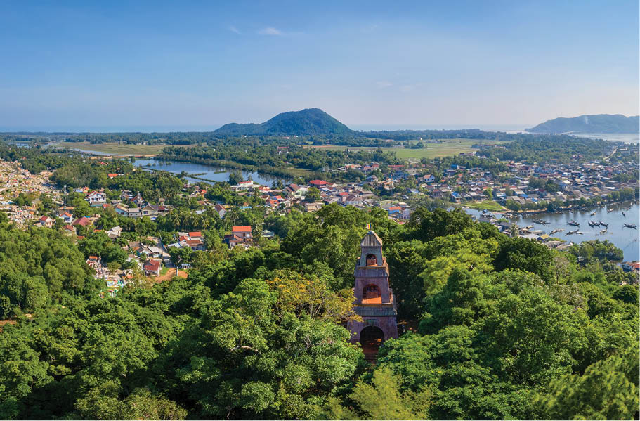 Contemplating the sunset from the high tower Dieu Ngu