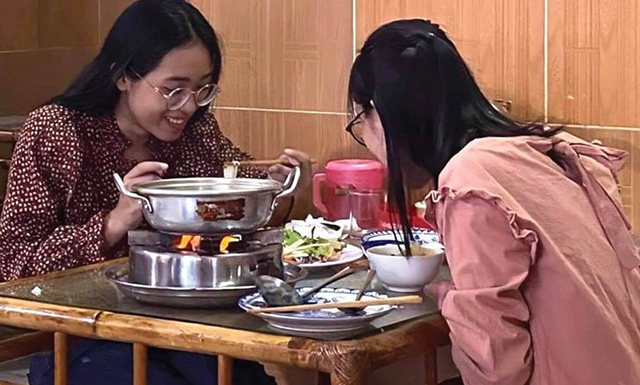 Young people choosing vegetarian food