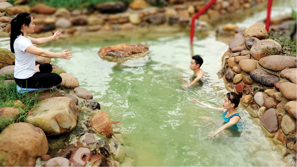 Taking a bath in hot springs in the winter