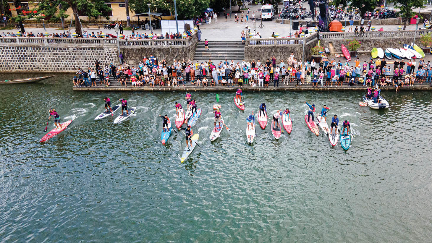 Relaxing by SUP surfing on the Huong River