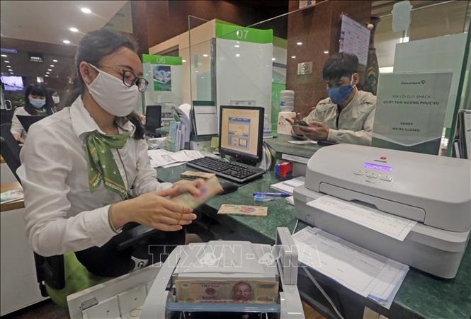 Ngân hàng thương mại tăng giảm lãi suất phải báo cáo Ngân hàng Nhà nước